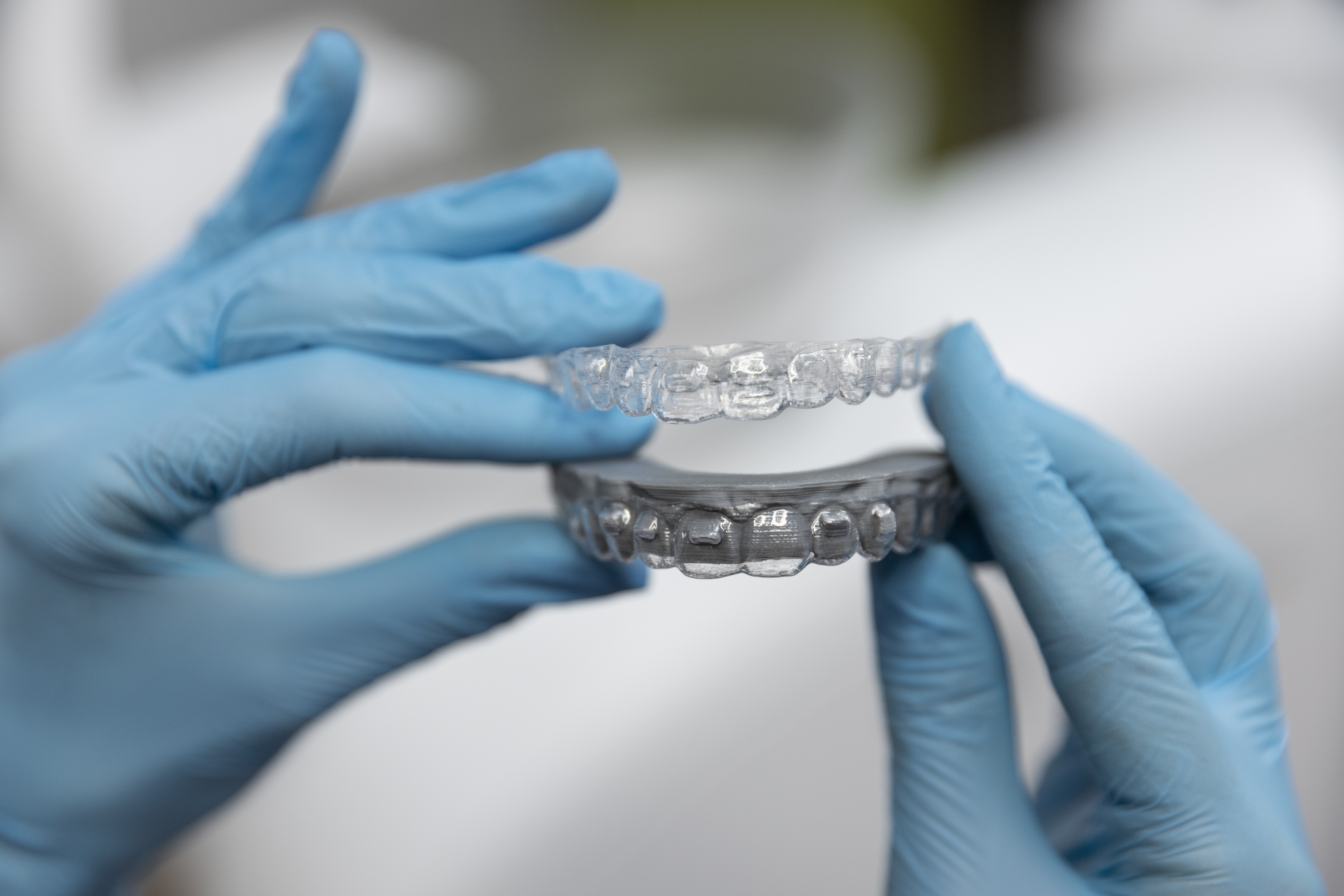 Clear aligners in dentist hands